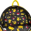 The inside of a yellow backpack with a Pokemon-themed lining. Náhled obrázku produktu