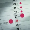 A close-up view of a calendar page with marked dates and handwritten text. Anteprima dell’immagine prodotto
