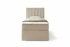 A single bed with a beige upholstered headboard and base, a mattress, and a pillow, presented against a white background. Produktbild-Vorschau