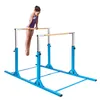 A young girl is performing a gymnastic routine on parallel bars. Anteprima dell’immagine prodotto