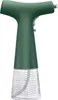 A green and clear automatic oil sprayer is shown against a white background. Podgląd zdjęcia produktu