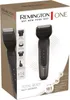 The image shows the retail packaging of a Remington Total Body Multi-Groomer. Produktbild-Vorschau