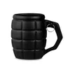 A black mug shaped like a grenade, shown from the side against a white background. Voir les images du produit