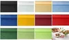 A collage of different colored rolls of fabric or paper, with a small inset image of a salad on a table. Podgląd zdjęcia produktu