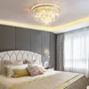 A bedroom scene with a bed, headboard, pillows, curtains, and a chandelier. Produktbild-Vorschau