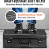 A person's feet are standing on a black storage case. Anteprima dell’immagine prodotto