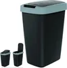 A black trash can with a gray lid and rim, shown from the front. Two smaller images of the trash can are shown on the left, one with the lid closed and one with the lid open. Produktbild-Vorschau