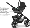 A black baby car seat attached to a stroller frame, with text overlay indicating compatibility. Anteprima dell’immagine prodotto