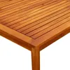 A close-up view of the corner of a wooden table. Náhled obrázku produktu