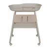 A baby changing table with an organizer and wheels, shown against a white background. Náhľad obrázku produktu