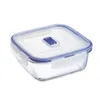 A clear studio shot of a glass food storage container with a blue lid. Produktbild-Vorschau