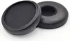 Two black ear pads for headphones are shown on a white background. Voir les images du produit