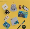 A collection of Batman-themed stationery items arranged on a yellow background. Produktbild-Vorschau