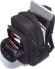 A black Eastpak laptop backpack is shown from a slightly elevated side angle, with its main compartment partially open to reveal a laptop and notebooks inside. A front pocket is also open, showing some papers and a pen. Anteprima dell’immagine prodotto