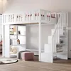 A white loft bed with stairs and storage shelves in a room. Produktbild-Vorschau