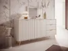 A modern, minimalist living room setting with a beige sideboard. Produktbild-Vorschau