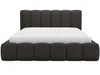 A dark gray upholstered bed with a white mattress, shown from the front on a white background. Produktbild-Vorschau
