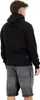 A man wearing a black hoodie and gray denim shorts, shown from the back. Produktbild-Vorschau