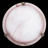 A top-down view of a ceiling light fixture with a pink and white swirled glass shade and three gold-colored metal fasteners. Anteprima dell’immagine prodotto