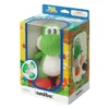 A knitted Yoshi amiibo figure in its retail packaging. Produktbild-Vorschau