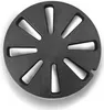 A black circular grate with triangular cutouts, shown from a top-down perspective against a white background. Produktbild-Vorschau