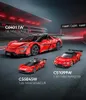 Three red toy cars of different sizes are displayed on a racetrack. Produktbild-Vorschau