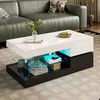 A modern living room with a green leather sofa and a white and black coffee table with LED lighting. Anteprima dell’immagine prodotto