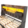 A close-up view of a bed frame's headboard with integrated storage and lighting. Produktbild-Vorschau