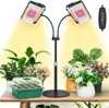 A grow light setup with plants on a table. Náhled obrázku produktu