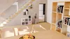 A modern living room with a staircase, a bookshelf, and a dining table with chairs. Náhled obrázku produktu