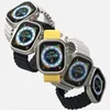 Multiple Apple Watch Ultra smartwatches with different colored bands are arranged in a layered composition against a white background. Náhled obrázku produktu
