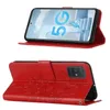 A red leather flip case for a Samsung Galaxy A51 5G phone, shown in two views: one open and displaying the phone screen, and the other closed, showing the embossed floral design. Produktbild-Vorschau