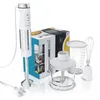 A product shot of a hand blender set with its accessories and packaging, displayed on a white background. Produktbild-Vorschau
