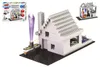 A Boffin II electronic construction kit with 20 projects, built into a house model with a light-up tower. Podgląd zdjęcia produktu