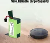 A battery pack and a robot vacuum cleaner on a wooden floor. Anteprima dell’immagine prodotto