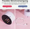 The image shows two ways to power a decorative light: with batteries or via USB. The background is pink. Produktbild-Vorschau