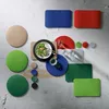 A collection of felt placemats and coasters arranged on a textured surface. Produktbild-Vorschau