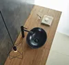A modern bathroom vanity with a black vessel sink and faucet. Náhľad obrázku produktu
