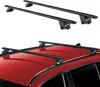 A set of black roof racks is shown against a white background, and another set is mounted on the roof of a red car. Anteprima dell’immagine prodotto