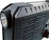 A close-up view of the side and top of a black electronic device, showing a flashlight on the left and ventilation grilles on the right. Produktbild-Vorschau
