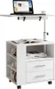 A white rolling nightstand with a laptop and a cup on top. Anteprima dell’immagine prodotto
