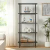 A black bookshelf with various decorative items and baskets on its shelves, placed in a well-lit room next to a window and a sofa. Podgląd zdjęcia produktu