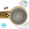 A close-up view of a gold-colored shower head with multiple spray settings, accompanied by a set of colored gaskets. Produktbild-Vorschau