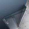 A close-up view of a shower door, angled to show its glass panels and metal frame. Produktbild-Vorschau