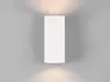 A white rectangular wall light fixture mounted on a gray wall, with light emanating from the top and bottom. Produktbild-Vorschau
