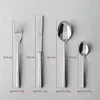 A set of four Villeroy & Boch Piemont cutlery pieces (fork, knife, tablespoon, teaspoon) are laid out on a light gray surface, with dimensions and weights indicated by overlaid text and lines. Náhled obrázku produktu