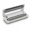 A white vacuum sealer machine with a roll of vacuum sealing bag material inside, shown with its lid open. Produktbild-Vorschau