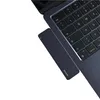 A close-up view of a laptop keyboard with a USB-C hub attached. Produktbild-Vorschau