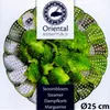 A steamer basket filled with broccoli, with branding and size information. Produktbild-Vorschau