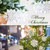 A collage of two images related to Christmas decorations. The top image shows frosted pine branches with white snowflake ornaments and text. The bottom image shows a Christmas tree with snowflake ornaments and blurred lights in the background. Produktbild-Vorschau